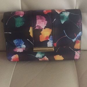 The Limited clutch with detachable strap