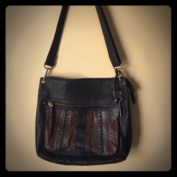 Boho chic leather fossil cross body tote!
