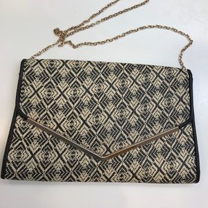 Clutch seen on Shay Mitchell !!