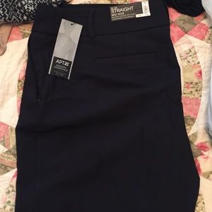 Black slim straight pants.