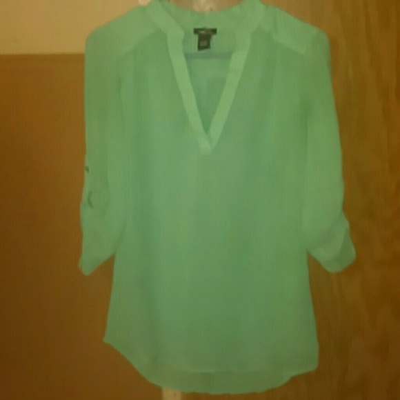 Mid thigh sheer shirt teal in color