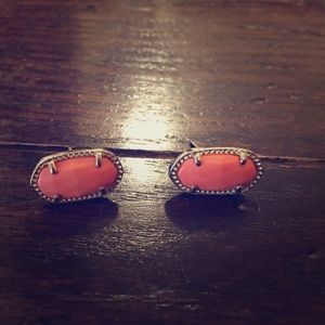 Kendra Scott coral earrings.