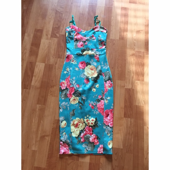 Floral. New with tags calf length dress
