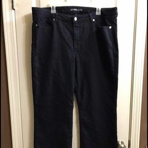 Never worn Michael Kors dark denim jeans.