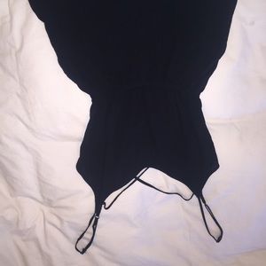 Black romper with crossed back. Size small