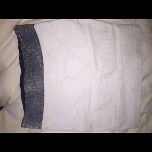 White body con skirt with black sparkle band.