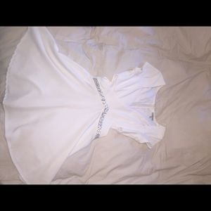 White dress with side cut outs.