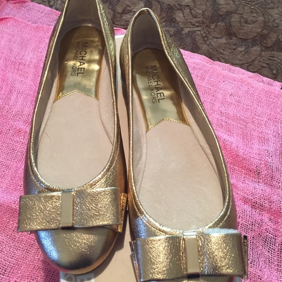 Gold Michael Kors, size 6, brand new.