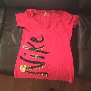 Pink Nike shirt