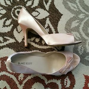 Blush satin pumps