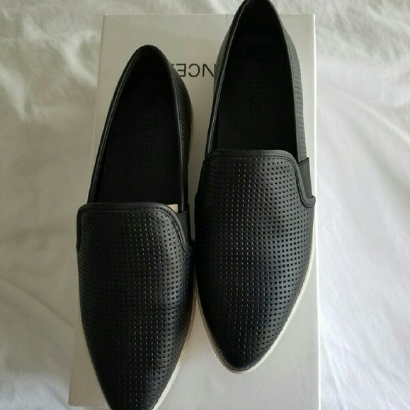 Black leather pointy toe slip on shoes