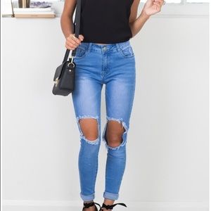 SHOWPO COURTS SKINNY JEANS IN MID WASH DENIM