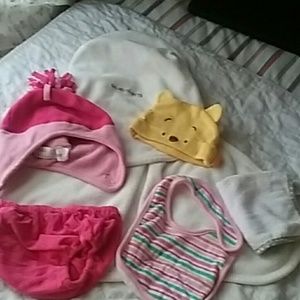 Includes shower gown / towel /hats/bib /und