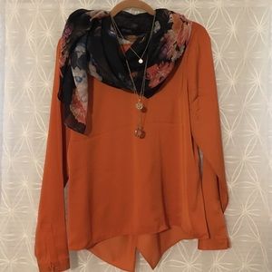 Limited blouse with cut away back detail