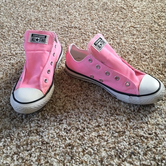 pink and white Chuck Taylor's size youth 3