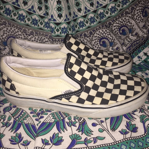 Checker pattern slip on vans