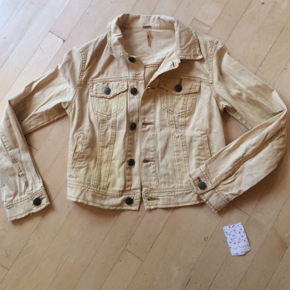 Free People mustard distressed jean jacket.