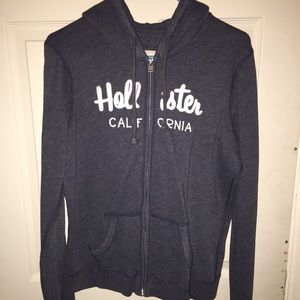 Large Hollister zip up blue jacket.
