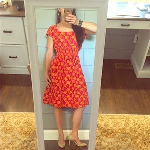 Red tribal print dress.