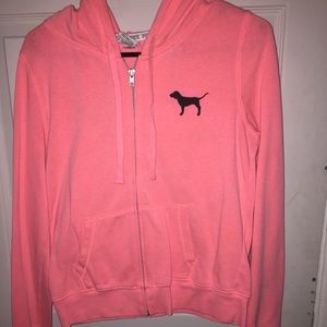 PINK zip up jacket.