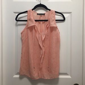 Pink sleeveless blouse
