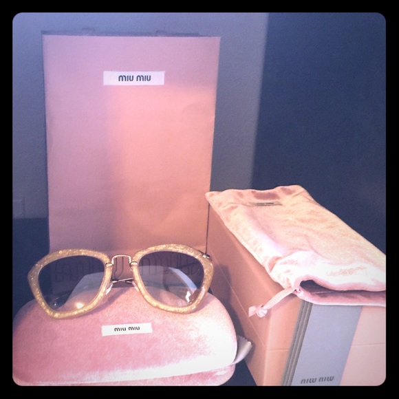 Authentic Miu Miu gold sunglasses.