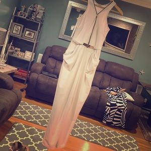White jumpsuit with gold belt attached