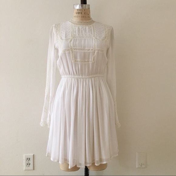 High neck Victorian style dress with lace trims