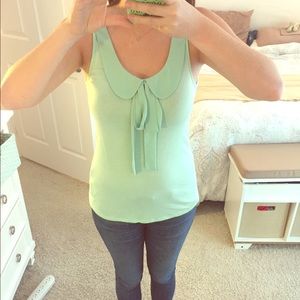 Bow tank with heart cut out in back