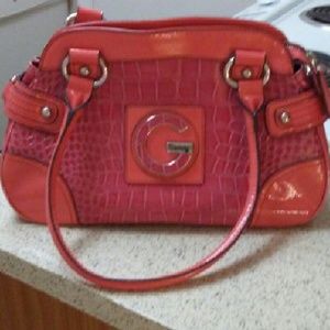 Guess pink and salmon purse