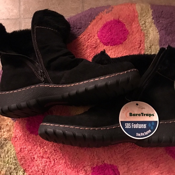 Brand new black ankle boots. Size 9.5. Bare traps