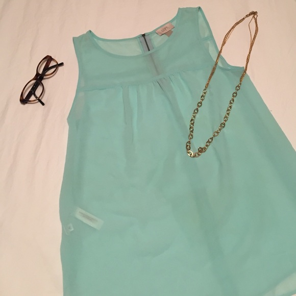 Sheer light blue blouse