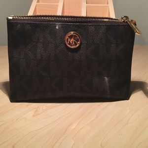Authentic Michael Kors makeup/travel bag