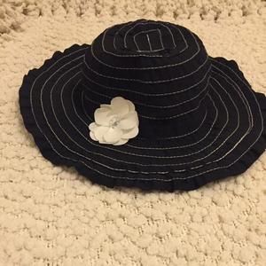 Black and white hat.