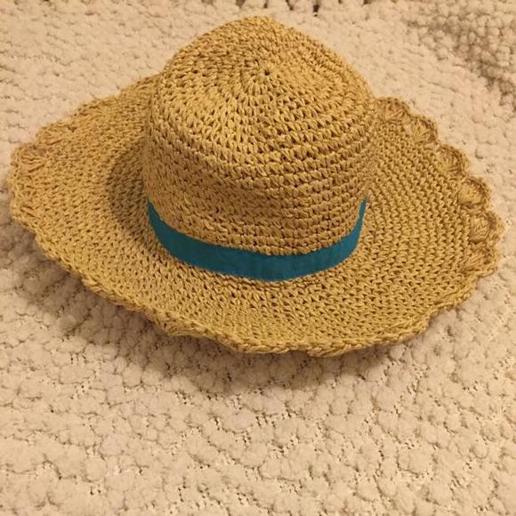 Straw hat with blue ribbon