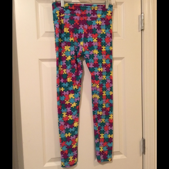LuLa Roe OS Multi color puzzle piece leggings.