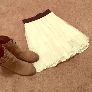 Lace off-white skirt.