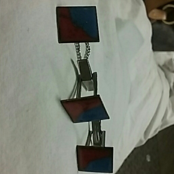 These are 60s styled cuff links and tie pin