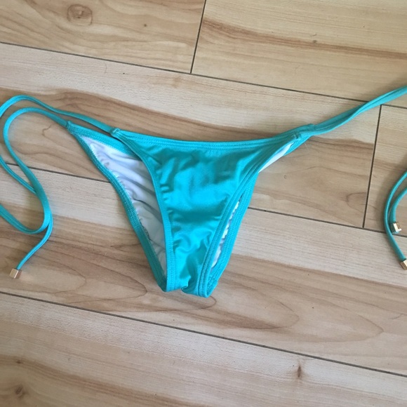 Victoria Secret skimpy string bottoms in Teal