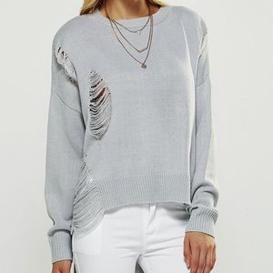 Funky High-Low Sweater with Distressed Decor