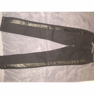 Black skinny jeans with leather accent