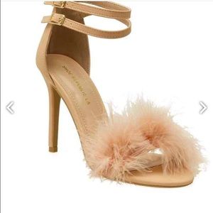 Faux fur pink heels