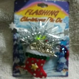 Christmas pins, flashing bulbs and tinsils