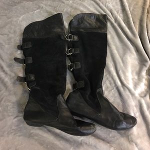 Used black leather and suede boots