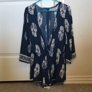 LONG SLEEVED NAVY ROMPER WITH ZIPPER CLOSURE