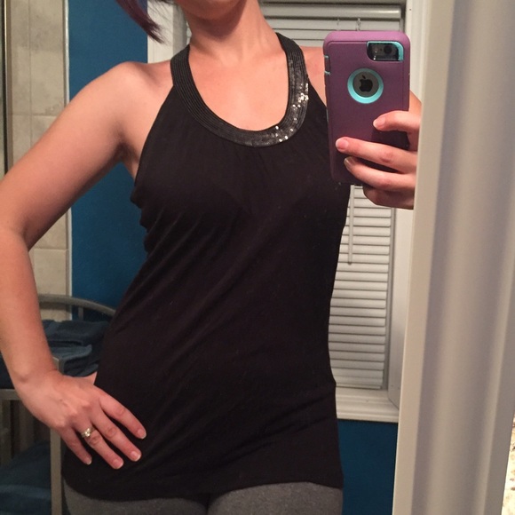 Slinky black top with sequin scoop neck racer back
