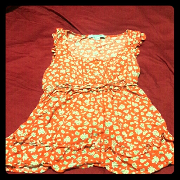 5/$10 Burnt Orange floral ruffled top