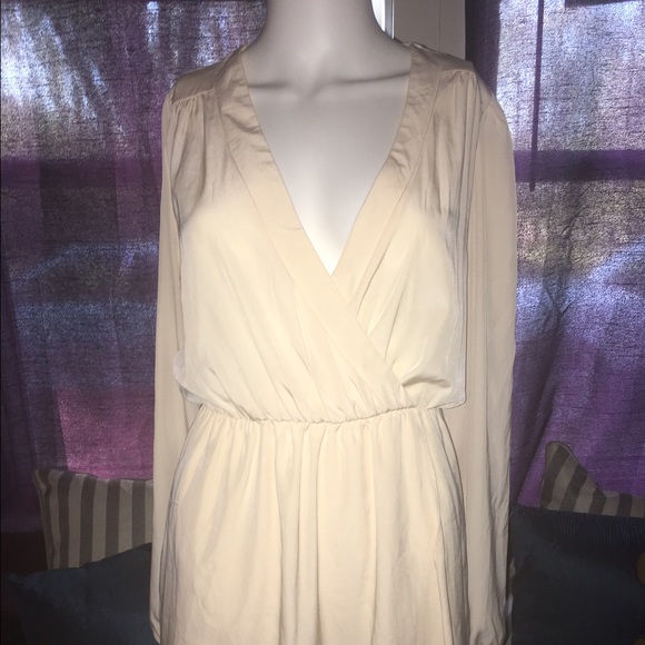 Light peach colored wrap dress