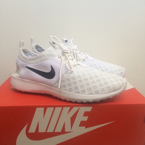 Women's Nike Juvenate sneakers in white. Size 8.5