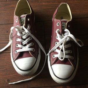 Burgundy leather converse